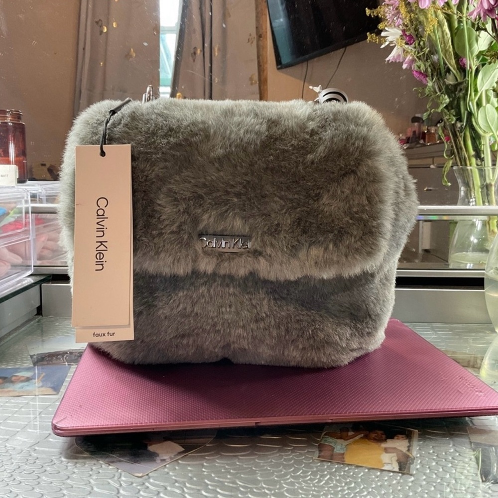 Brand new with dust bag CALVIN KLIEN FAUX FUR BAG